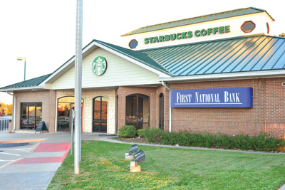 First National Bank of Bastrop added a Starbucks to its drive-thru facility to increase traffic and exposure.