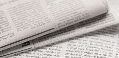Op-ed in the local paper are a form of earned media.