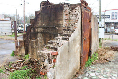 Tomball’s historic vault sits in the middle of a vacant lot. Photo by Melanie Feuk.
