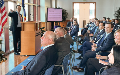 Federal Reserve Senior Business Economist Jesse Thompson briefs Bank Leaders in Houston on the critical links between the Texas energy industry, the local economy and global markets.