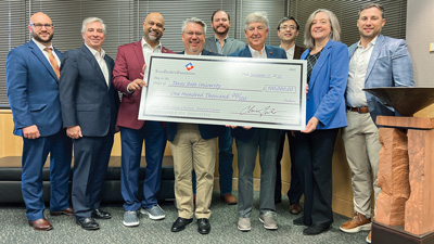 Left to Right: Jason Qualls, Frost Bank; Brent Cox, TBA; Dr. Sanjay Ramchander and Dr. William Chittenden, McCoy College of Business; Colby Smith, The First State Bank, Louise; Jimmy Allen, McCoy College of Business; Dr. Haiyong Liu, McCoy College of Business; Jocelyn Carby, TBA; and Lance Spruiell, Texas Regional Bank.