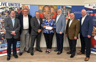 Tom Adams and Terry Whitley of Security Bank of Texas, Faron Phinney of Horizon Bank, United Way CEO/President Stephanie O’Banion, Chris Furlow, Bobby Hoxworth of First National Bank Texas and Brian Reinhardt of Extraco Bank.